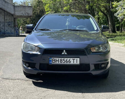 Синій Міцубісі Lancer, об'ємом двигуна 2 л та пробігом 226 тис. км за 6700 $, фото 1 на Automoto.ua