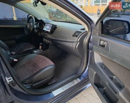 Синій Міцубісі Lancer, об'ємом двигуна 2 л та пробігом 234 тис. км за 6700 $, фото 11 на Automoto.ua