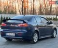 Синий Мицубиси Лансер, объемом двигателя 2 л и пробегом 230 тыс. км за 6400 $, фото 7 на Automoto.ua