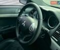 Синий Мицубиси Лансер, объемом двигателя 2 л и пробегом 178 тыс. км за 5500 $, фото 17 на Automoto.ua