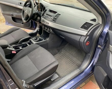 Синий Мицубиси Лансер, объемом двигателя 1.5 л и пробегом 267 тыс. км за 4900 $, фото 5 на Automoto.ua