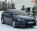 Синій Міцубісі Lancer, об'ємом двигуна 2 л та пробігом 220 тис. км за 7000 $, фото 1 на Automoto.ua