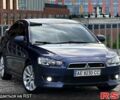 Синій Міцубісі Lancer, об'ємом двигуна 2 л та пробігом 230 тис. км за 7799 $, фото 1 на Automoto.ua