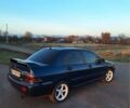Синій Міцубісі Lancer, об'ємом двигуна 2 л та пробігом 222 тис. км за 3999 $, фото 6 на Automoto.ua
