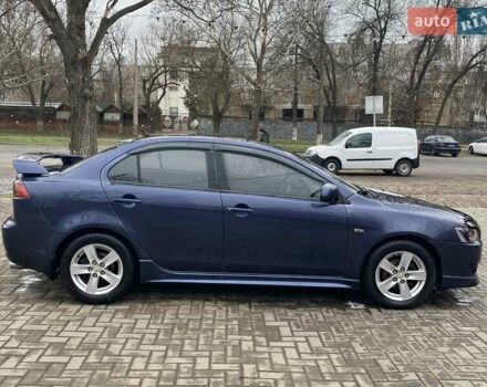Синій Міцубісі Lancer, об'ємом двигуна 2 л та пробігом 210 тис. км за 6800 $, фото 7 на Automoto.ua