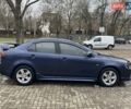 Синій Міцубісі Lancer, об'ємом двигуна 2 л та пробігом 210 тис. км за 6800 $, фото 7 на Automoto.ua