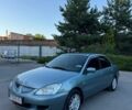 Синій Міцубісі Lancer, об'ємом двигуна 1.58 л та пробігом 230 тис. км за 4100 $, фото 1 на Automoto.ua