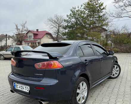 Синий Мицубиси Лансер, объемом двигателя 2 л и пробегом 326 тыс. км за 5650 $, фото 6 на Automoto.ua