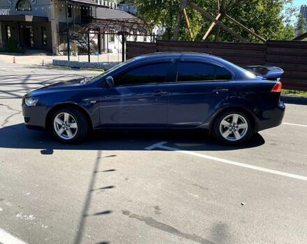 Синій Міцубісі Lancer, об'ємом двигуна 2 л та пробігом 300 тис. км за 5850 $, фото 3 на Automoto.ua