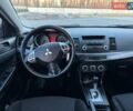 Синий Мицубиси Лансер, объемом двигателя 2 л и пробегом 230 тыс. км за 6400 $, фото 14 на Automoto.ua