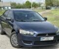 Синий Мицубиси Лансер, объемом двигателя 1.5 л и пробегом 180 тыс. км за 5299 $, фото 4 на Automoto.ua