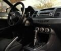 Синій Міцубісі Lancer, об'ємом двигуна 2 л та пробігом 189 тис. км за 7350 $, фото 19 на Automoto.ua