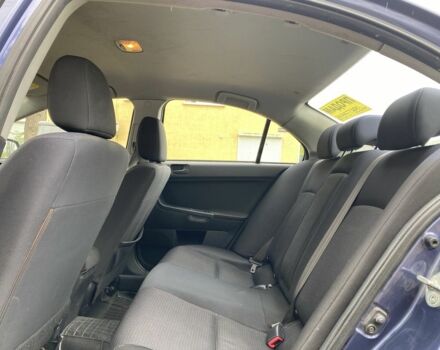 Синий Мицубиси Лансер, объемом двигателя 1.5 л и пробегом 267 тыс. км за 4900 $, фото 6 на Automoto.ua