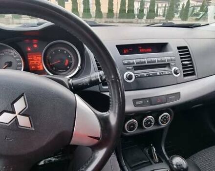 Синій Міцубісі Lancer, об'ємом двигуна 1.5 л та пробігом 206 тис. км за 5700 $, фото 3 на Automoto.ua