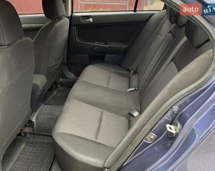 Синій Міцубісі Lancer, об'ємом двигуна 2 л та пробігом 210 тис. км за 6800 $, фото 20 на Automoto.ua
