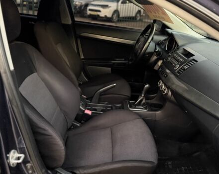 Синій Міцубісі Lancer, об'ємом двигуна 2 л та пробігом 189 тис. км за 7350 $, фото 18 на Automoto.ua