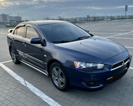 Синій Міцубісі Lancer, об'ємом двигуна 2 л та пробігом 228 тис. км за 7000 $, фото 2 на Automoto.ua