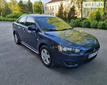 Синій Міцубісі Lancer, об'ємом двигуна 2 л та пробігом 155 тис. км за 7000 $, фото 4 на Automoto.ua