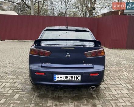 Синій Міцубісі Lancer, об'ємом двигуна 2 л та пробігом 210 тис. км за 6800 $, фото 11 на Automoto.ua