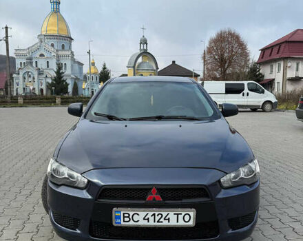 Синий Мицубиси Лансер, объемом двигателя 2 л и пробегом 326 тыс. км за 5650 $, фото 3 на Automoto.ua