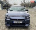 Синій Міцубісі Lancer, об'ємом двигуна 2 л та пробігом 210 тис. км за 6800 $, фото 3 на Automoto.ua