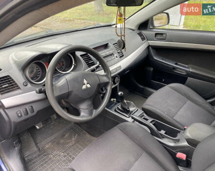 Синій Міцубісі Lancer, об'ємом двигуна 1.5 л та пробігом 271 тис. км за 4900 $, фото 9 на Automoto.ua