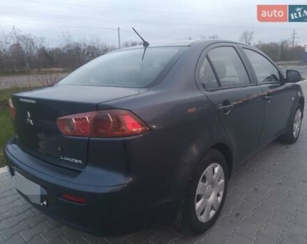 Синий Мицубиси Лансер, объемом двигателя 1.5 л и пробегом 260 тыс. км за 5000 $, фото 5 на Automoto.ua