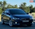 Синій Міцубісі Lancer, об'ємом двигуна 2 л та пробігом 255 тис. км за 6500 $, фото 1 на Automoto.ua