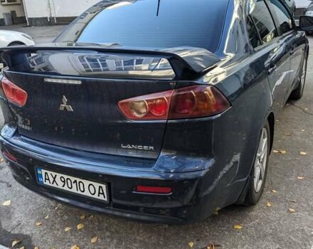 Синий Мицубиси Лансер, объемом двигателя 2 л и пробегом 300 тыс. км за 6250 $, фото 5 на Automoto.ua