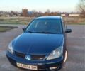 Синій Міцубісі Lancer, об'ємом двигуна 2 л та пробігом 222 тис. км за 3999 $, фото 3 на Automoto.ua