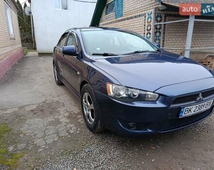 Синий Мицубиси Лансер, объемом двигателя 1.5 л и пробегом 211 тыс. км за 5222 $, фото 4 на Automoto.ua