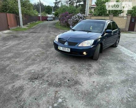 Синій Міцубісі Lancer, об'ємом двигуна 1.6 л та пробігом 189 тис. км за 6300 $, фото 7 на Automoto.ua