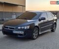 Синій Міцубісі Lancer, об'ємом двигуна 2 л та пробігом 234 тис. км за 6700 $, фото 2 на Automoto.ua