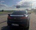 Синий Мицубиси Лансер, объемом двигателя 2 л и пробегом 240 тыс. км за 6218 $, фото 3 на Automoto.ua