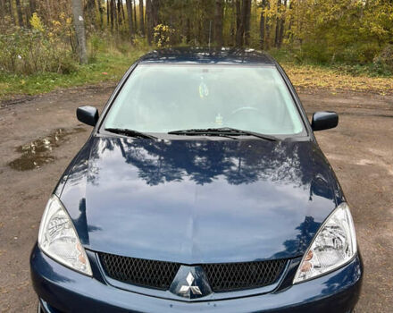 Синий Мицубиси Лансер, объемом двигателя 1.6 л и пробегом 150 тыс. км за 5700 $, фото 9 на Automoto.ua