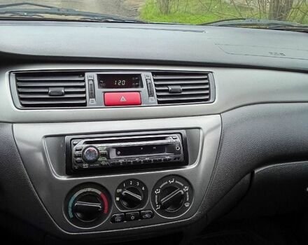 Синій Міцубісі Lancer, об'ємом двигуна 1.6 л та пробігом 167 тис. км за 4700 $, фото 10 на Automoto.ua