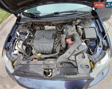 Синий Мицубиси Лансер, объемом двигателя 1.5 л и пробегом 220 тыс. км за 6999 $, фото 7 на Automoto.ua