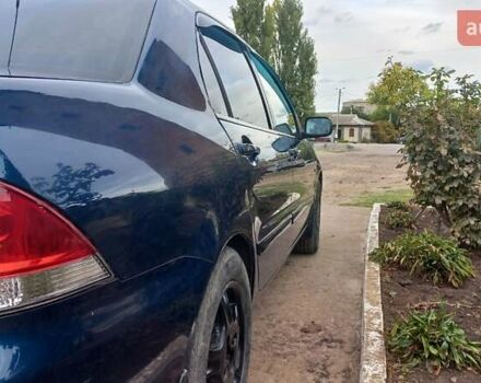 Синій Міцубісі Lancer, об'ємом двигуна 1.58 л та пробігом 220 тис. км за 4200 $, фото 10 на Automoto.ua