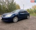 Синий Мицубиси Лансер, объемом двигателя 1.58 л и пробегом 230 тыс. км за 4500 $, фото 1 на Automoto.ua