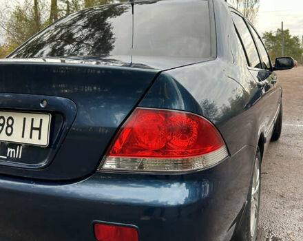 Синий Мицубиси Лансер, объемом двигателя 1.6 л и пробегом 150 тыс. км за 5700 $, фото 53 на Automoto.ua