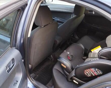 Синій Міцубісі Lancer, об'ємом двигуна 2 л та пробігом 290 тис. км за 5000 $, фото 10 на Automoto.ua