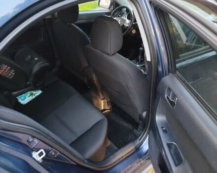 Синій Міцубісі Lancer, об'ємом двигуна 2 л та пробігом 290 тис. км за 5000 $, фото 8 на Automoto.ua