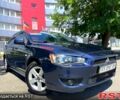 Синій Міцубісі Lancer, об'ємом двигуна 2 л та пробігом 255 тис. км за 6600 $, фото 1 на Automoto.ua