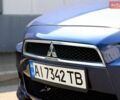 Синий Мицубиси Лансер, объемом двигателя 2 л и пробегом 243 тыс. км за 6900 $, фото 40 на Automoto.ua