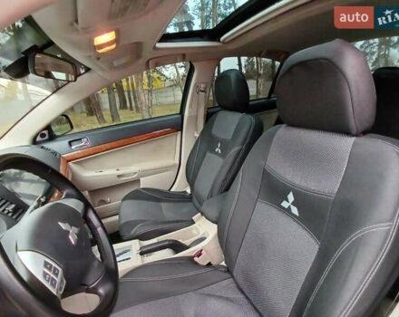 Синий Мицубиси Лансер, объемом двигателя 1.5 л и пробегом 220 тыс. км за 6999 $, фото 1 на Automoto.ua