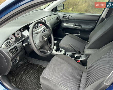 Синий Мицубиси Лансер, объемом двигателя 1.59 л и пробегом 126 тыс. км за 5950 $, фото 9 на Automoto.ua