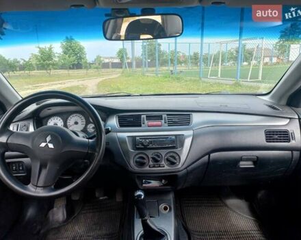 Синій Міцубісі Lancer, об'ємом двигуна 1.6 л та пробігом 275 тис. км за 5100 $, фото 6 на Automoto.ua