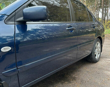 Синий Мицубиси Лансер, объемом двигателя 1.6 л и пробегом 150 тыс. км за 5700 $, фото 51 на Automoto.ua