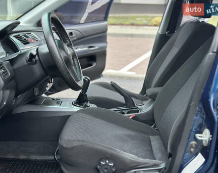 Синий Мицубиси Лансер, объемом двигателя 1.6 л и пробегом 187 тыс. км за 3799 $, фото 16 на Automoto.ua