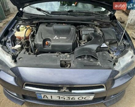 Синий Мицубиси Лансер, объемом двигателя 1.97 л и пробегом 260 тыс. км за 6000 $, фото 9 на Automoto.ua